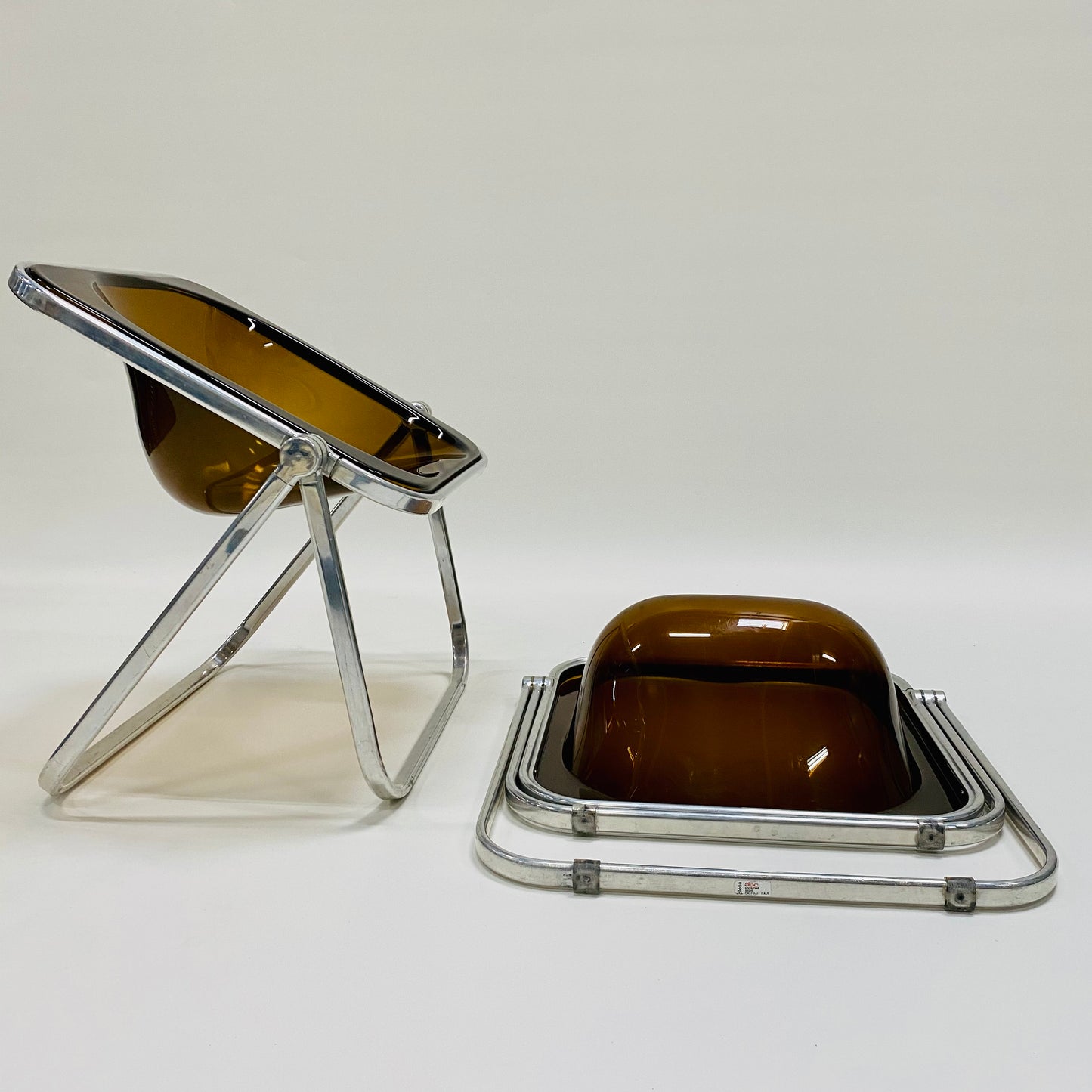 EXTREMELY RARE SET OF PLONA FOLDING CHAIRS BY GIANCARLO PIRETTI FOR CASTELLI, ITALY 1970S www.foundicons.nl