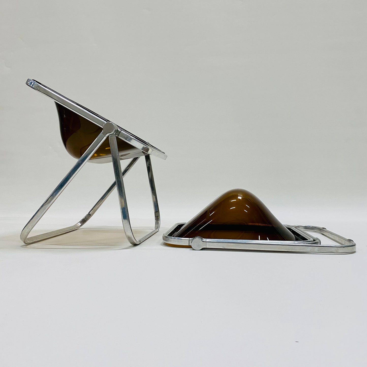 EXTREMELY RARE SET OF PLONA FOLDING CHAIRS BY GIANCARLO PIRETTI FOR CASTELLI, ITALY 1970S www.foundicons.nl