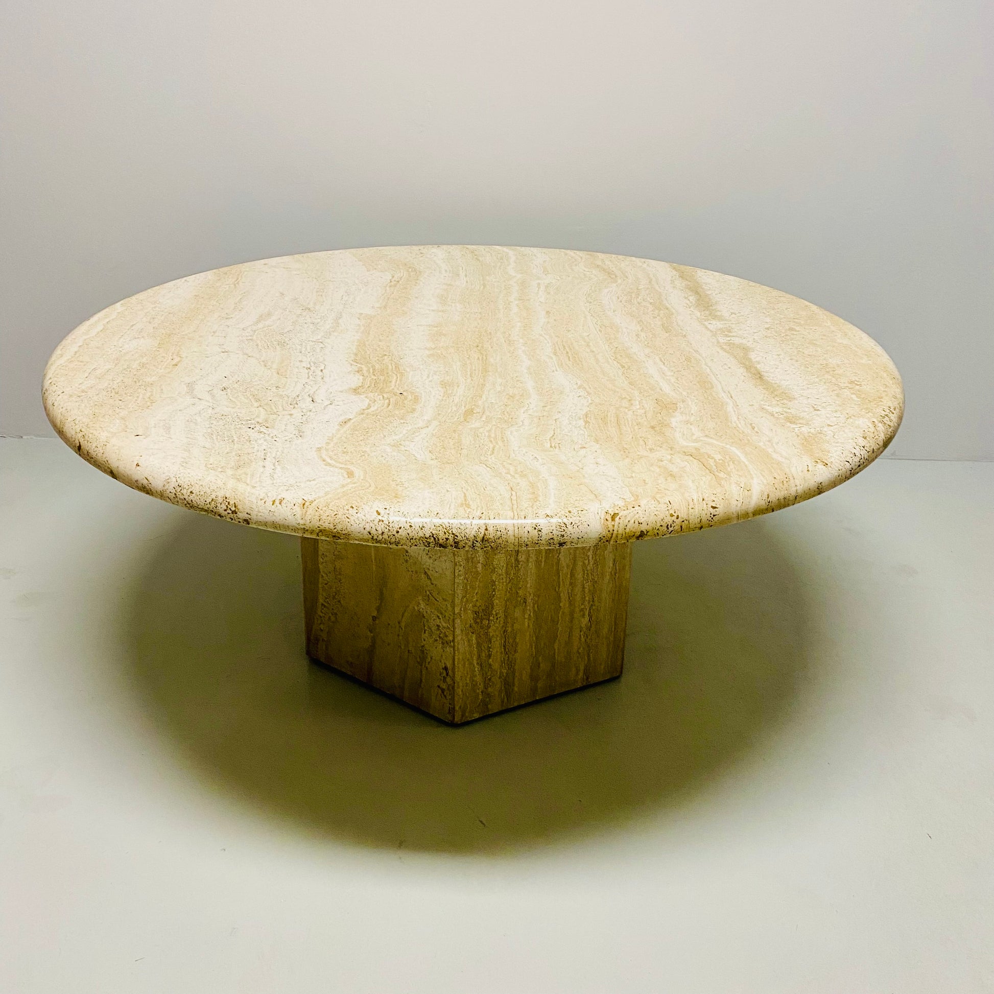LARGE ROUND TRAVERTINE COFFEE TABLE WITH HEXAGONAL BASE, ITALY 1970S