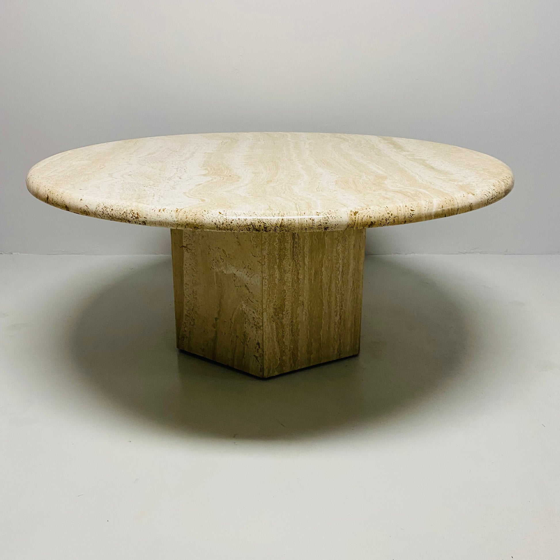 LARGE ROUND TRAVERTINE COFFEE TABLE WITH HEXAGONAL BASE, ITALY 1970S