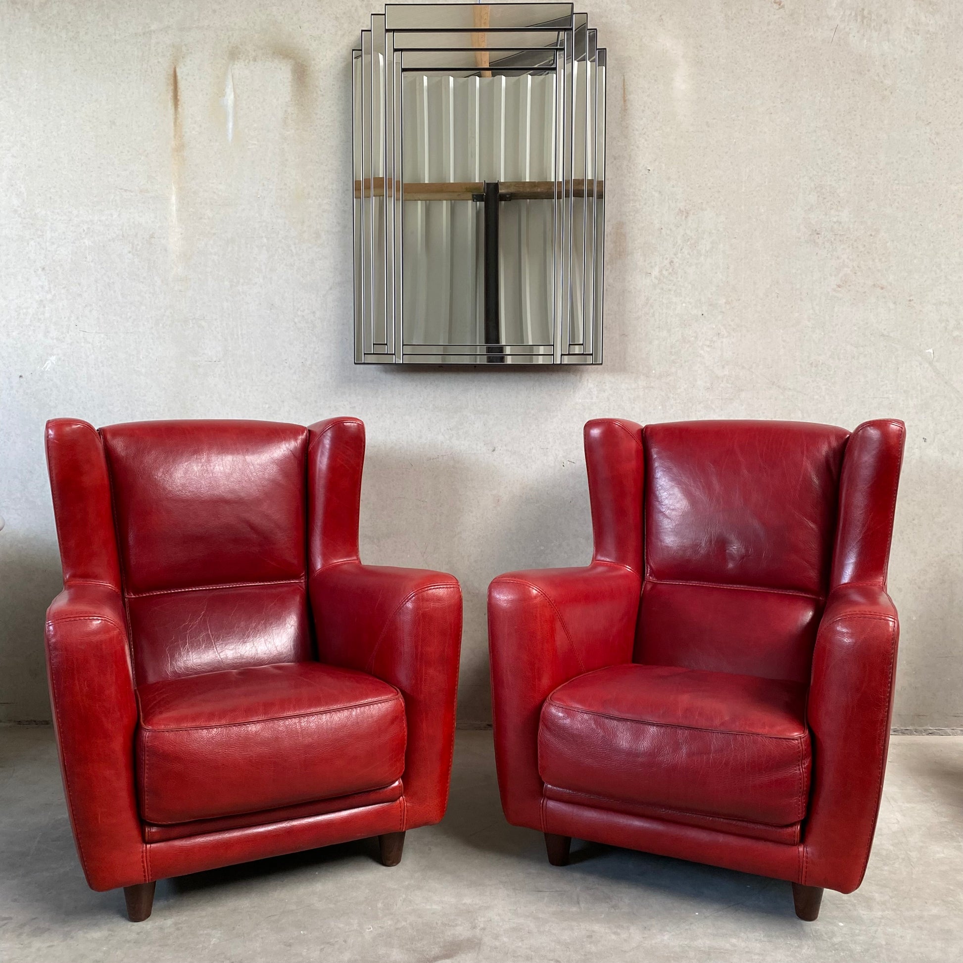 OX-BLOOD RED LEATHER LOUNGE CHAIRS "BERGÈRE" BY BAXTER, ITALY
