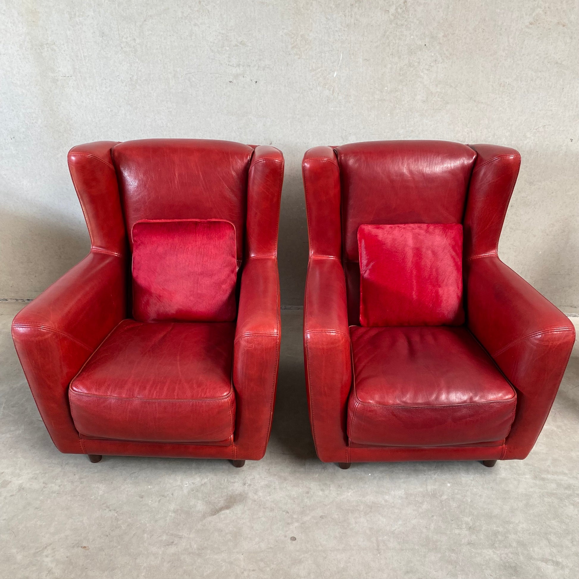OX-BLOOD RED LEATHER LOUNGE CHAIRS "BERGÈRE" BY BAXTER, ITALY