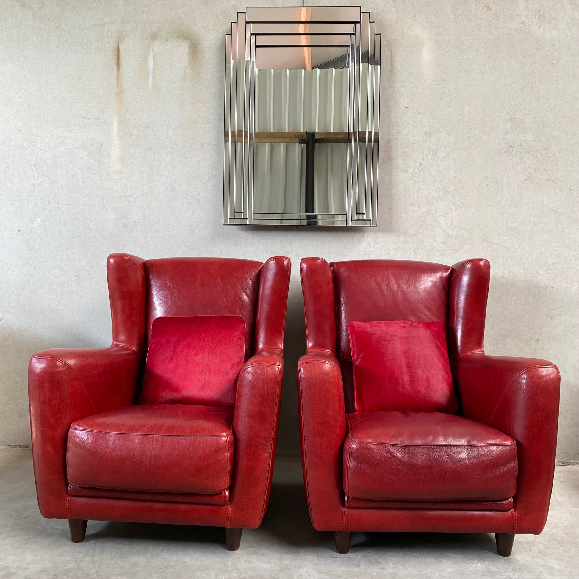 OX-BLOOD RED LEATHER LOUNGE CHAIRS "BERGÈRE" BY BAXTER, ITALY