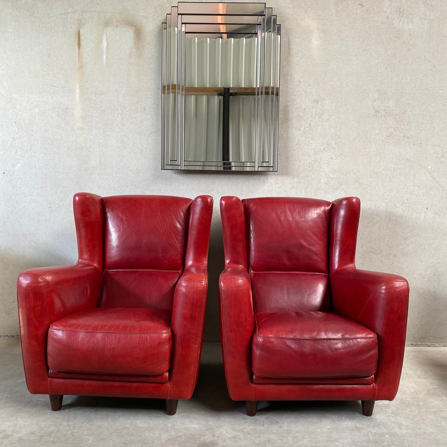 OX-BLOOD RED LEATHER LOUNGE CHAIRS "BERGÈRE" BY BAXTER, ITALY