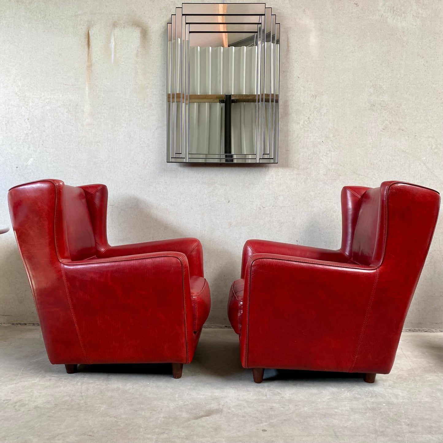 OX-BLOOD RED LEATHER LOUNGE CHAIRS "BERGÈRE" BY BAXTER, ITALY