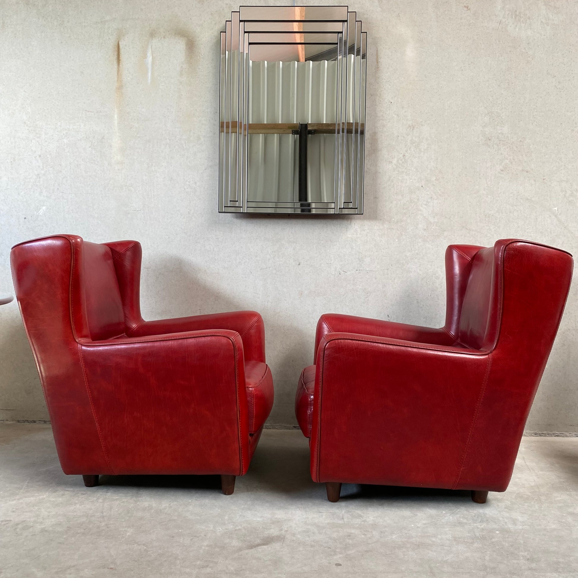 OX-BLOOD RED LEATHER LOUNGE CHAIRS "BERGÈRE" BY BAXTER, ITALY