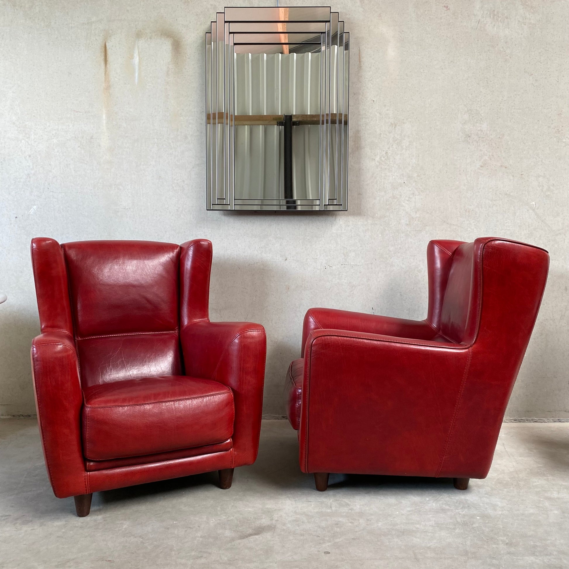 OX-BLOOD RED LEATHER LOUNGE CHAIRS "BERGÈRE" BY BAXTER, ITALY