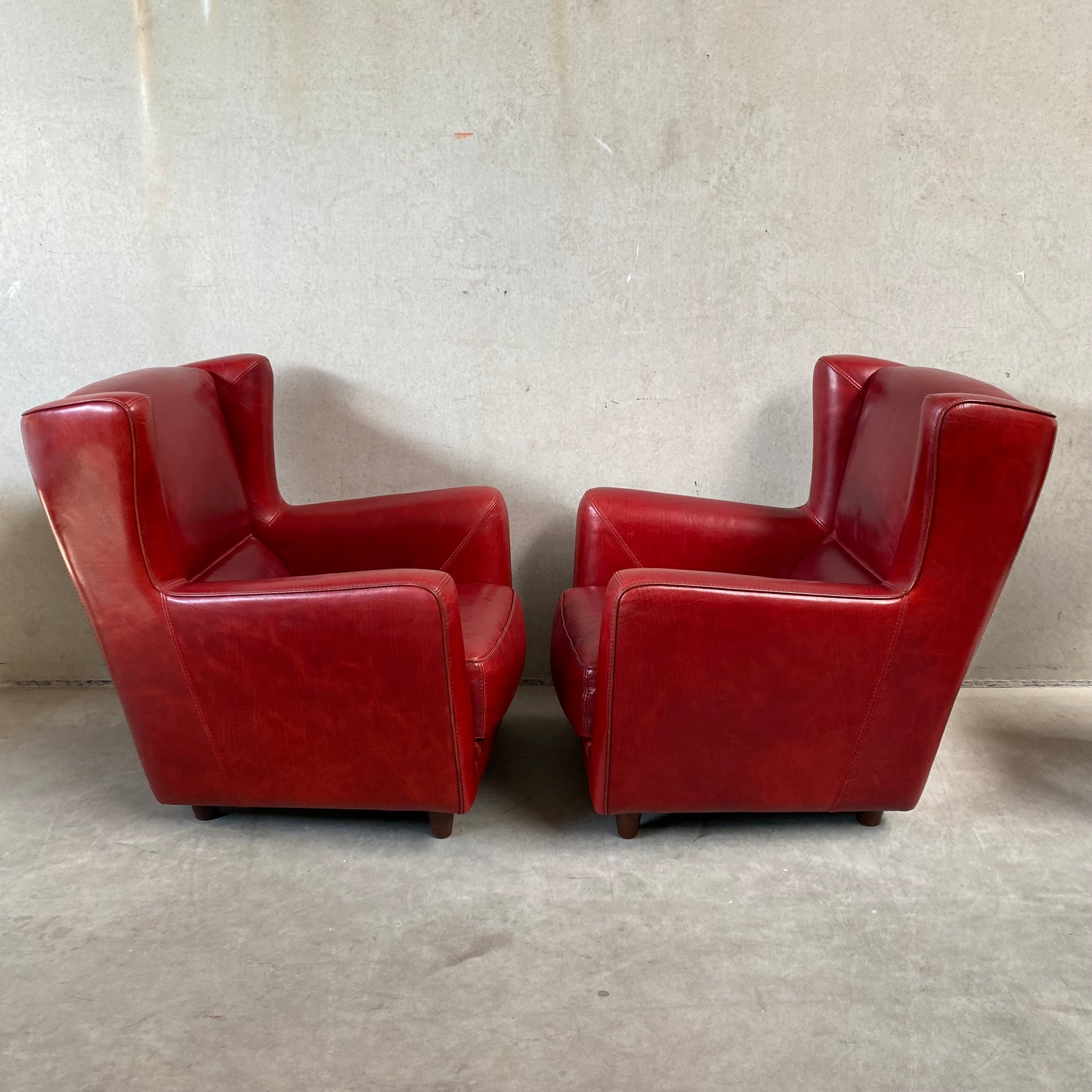 OX-BLOOD RED LEATHER LOUNGE CHAIRS "BERGÈRE" BY BAXTER, ITALY