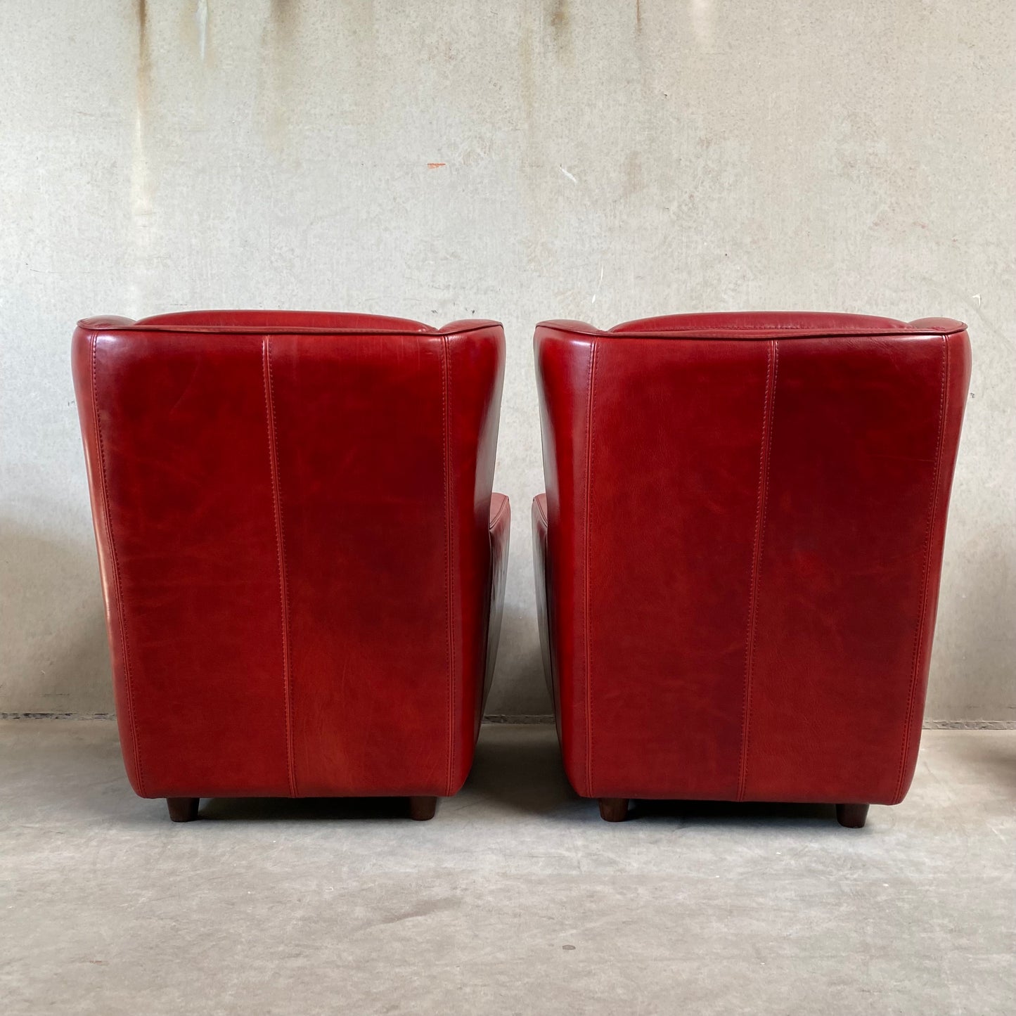 OX-BLOOD RED LEATHER LOUNGE CHAIRS "BERGÈRE" BY BAXTER, ITALY