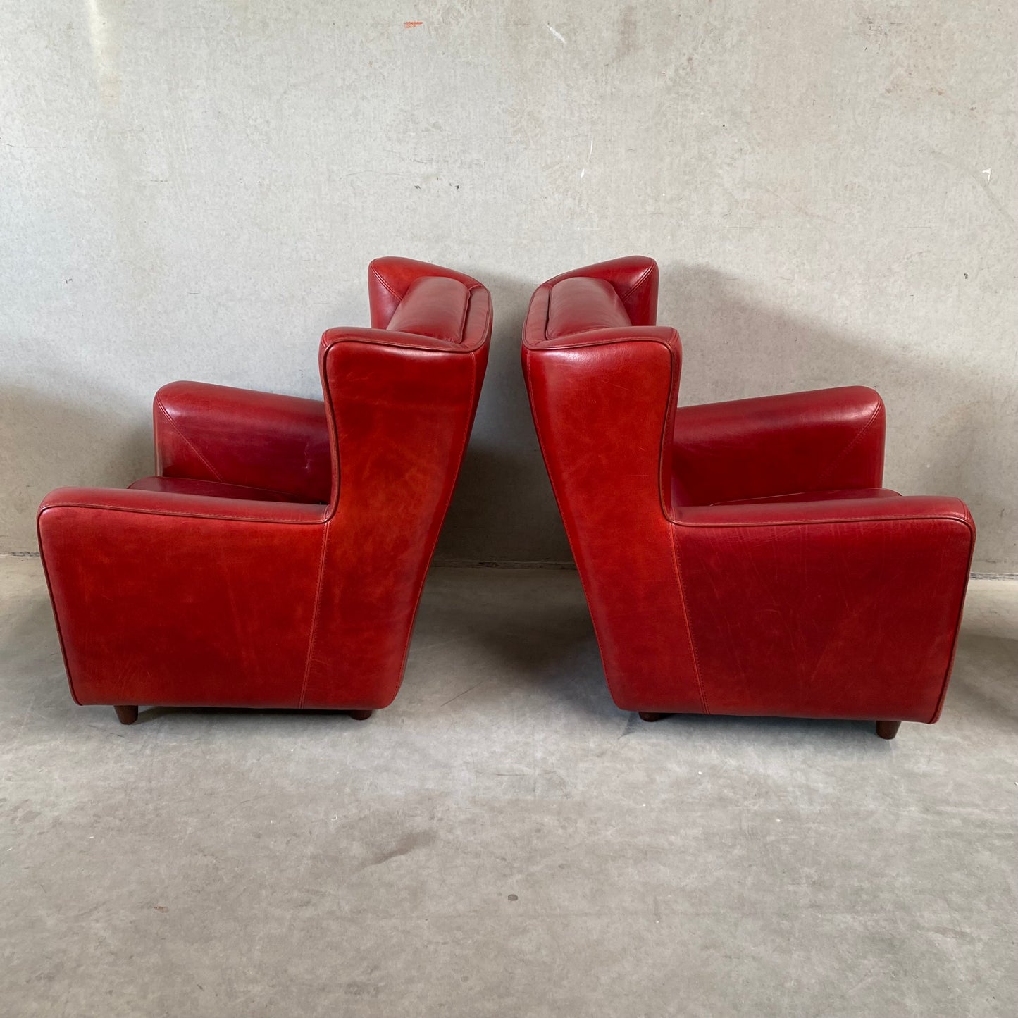 OX-BLOOD RED LEATHER LOUNGE CHAIRS "BERGÈRE" BY BAXTER, ITALY
