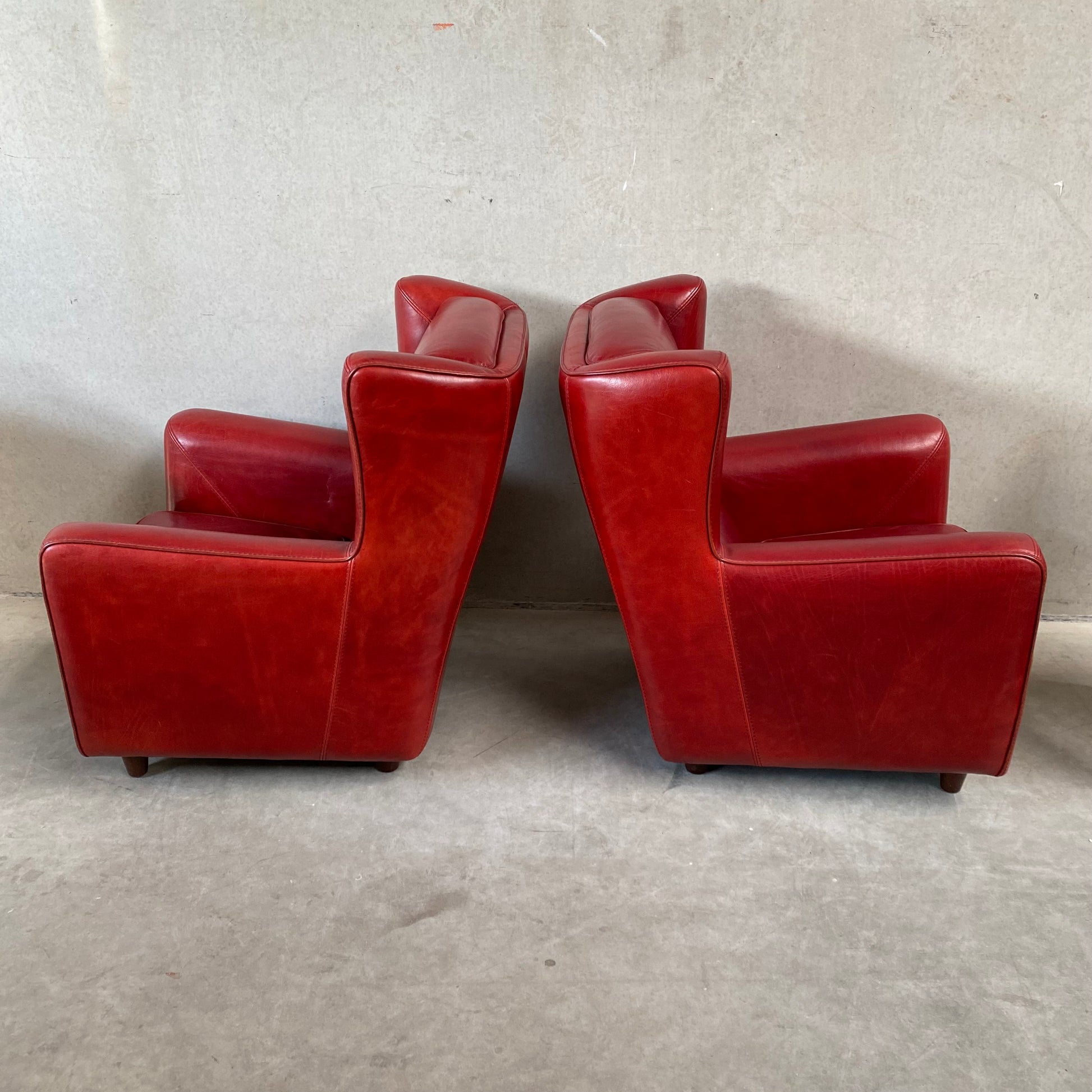 OX-BLOOD RED LEATHER LOUNGE CHAIRS "BERGÈRE" BY BAXTER, ITALY