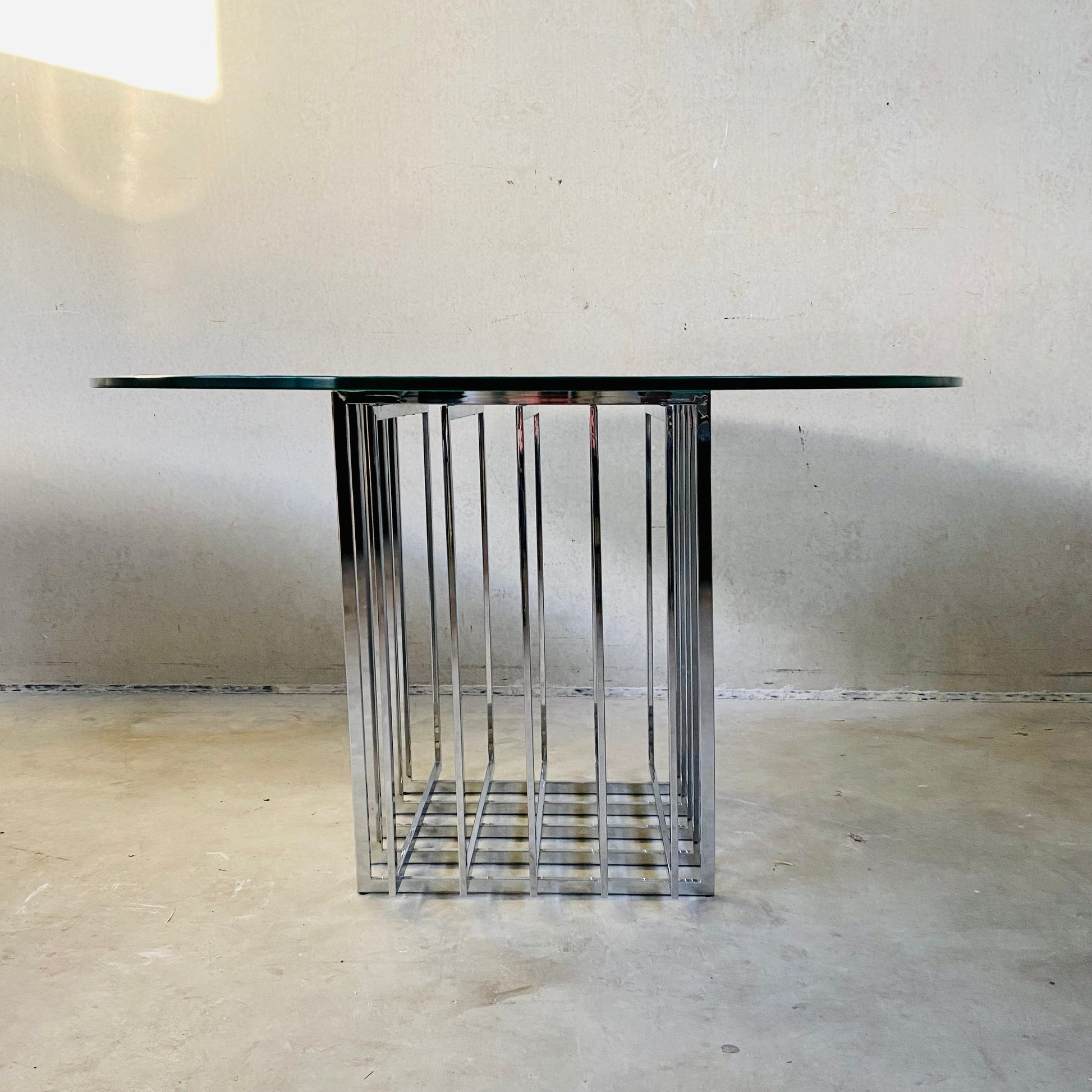PIERRE CARDIN SCULPTURAL DINING TABLE IN GLASS AND METAL, FRANCE 1970S